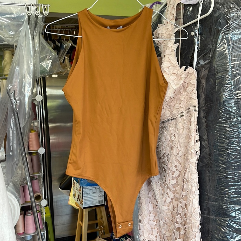 Brand new tan body suit